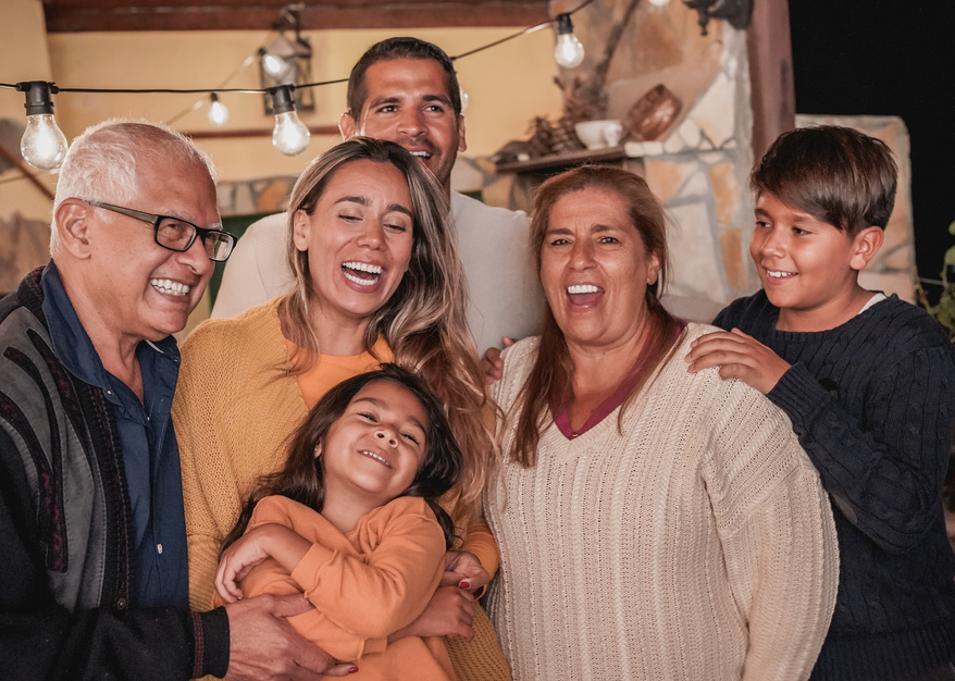 Hapy latin family smiling on camera - Family love